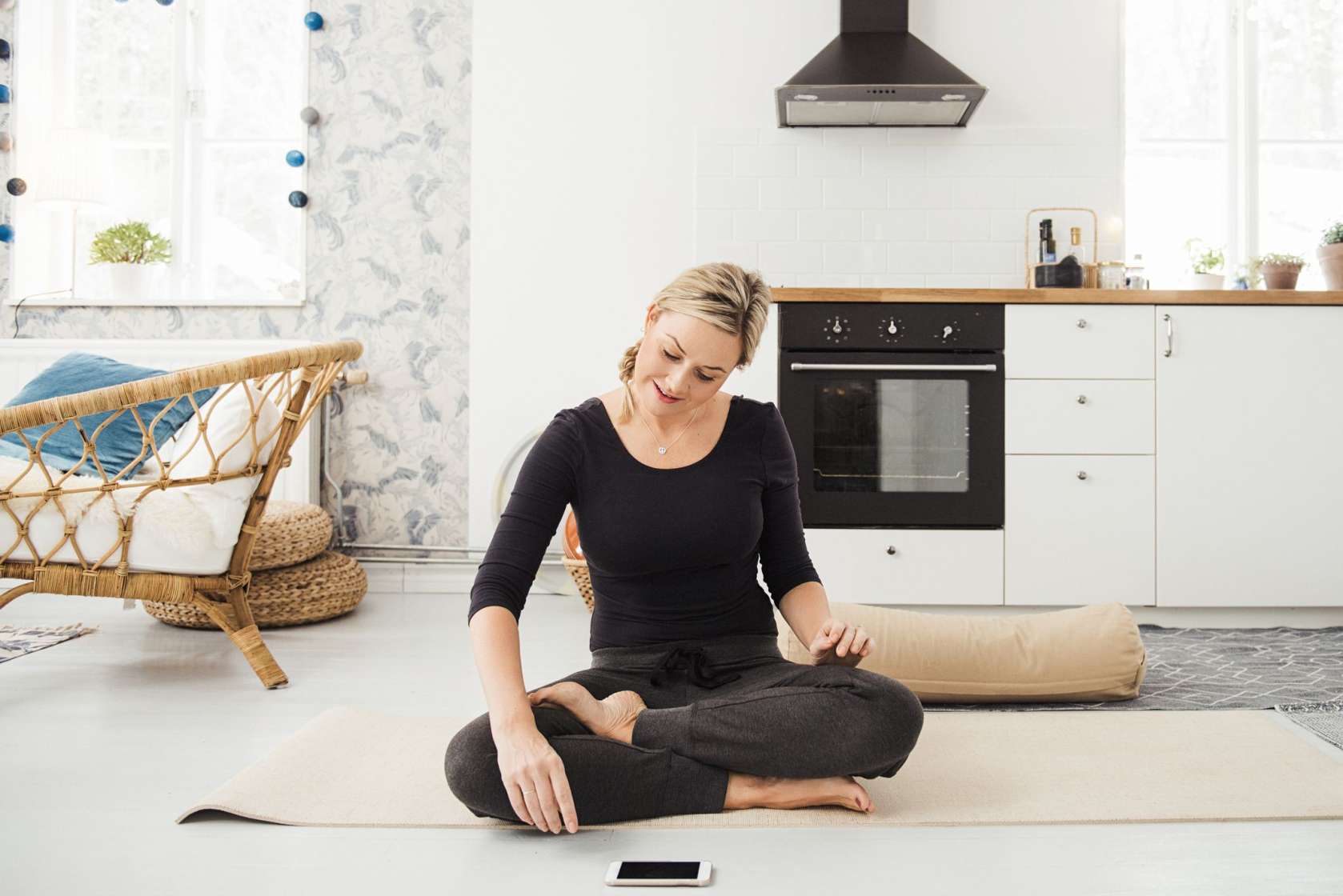 woman meditating at home